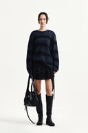 MULTI PANEL LAYERED SKIRT IN BLACK