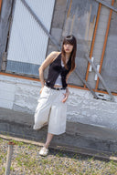 LAYERED BUTTON HALTER NECK TOP IN BLACK image 9