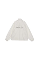 MATIN KIM LOGO COATING JUMPER IN IVORY image 10