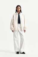 BACK LOGO HIGH NECK JUMPER IN CREAM image 11