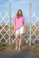CUT LINE POINT DENIM SHORTS IN WHITE image 13