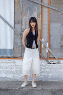 LAYERED BUTTON HALTER NECK TOP IN BLACK image 12
