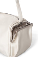 SIDE POCKET DUFFLE BAG IN BLACK IN IVORY