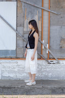 LAYERED BUTTON HALTER NECK TOP IN BLACK image 18