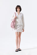 MESH LOGO WRAP MINI SKIRT IN WHITE image 19